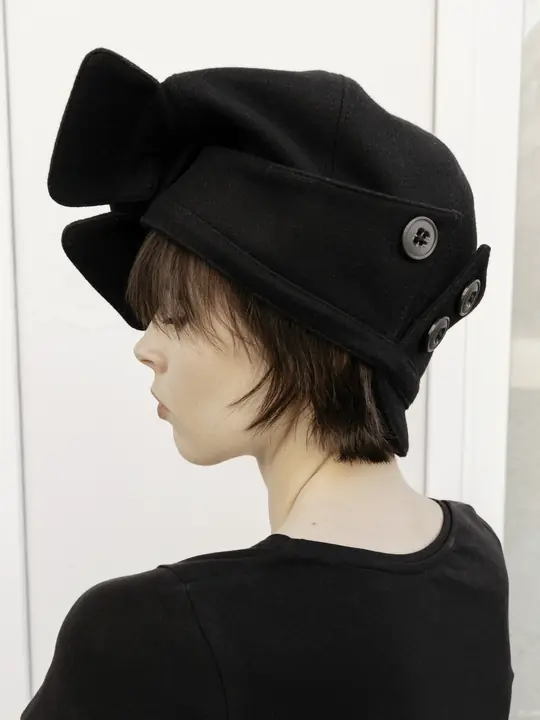 Rear angled PETAL beret styling view