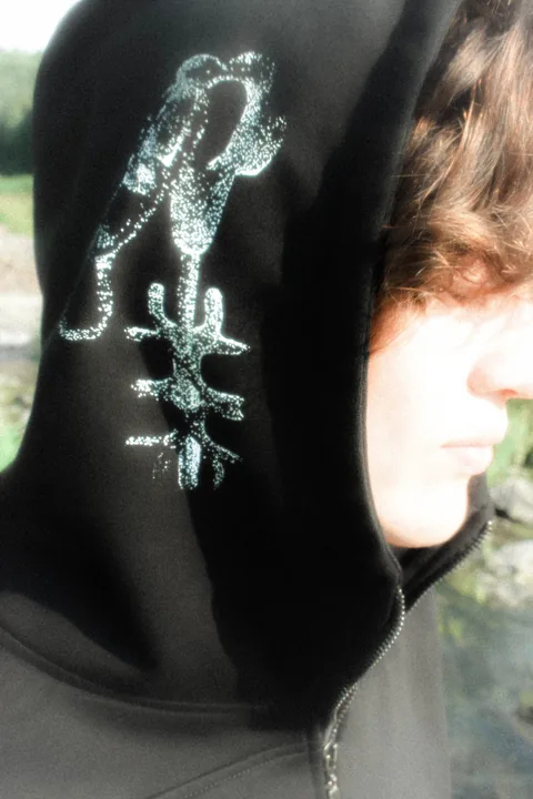 KEY hoodie worn outdoors with cropped body detail