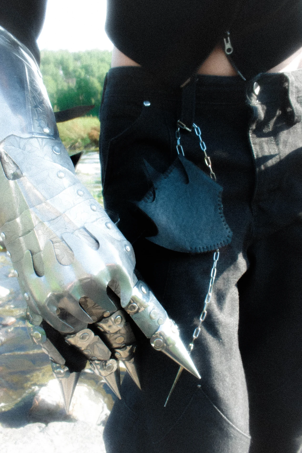 Model carrying the DRAGON wallet in an outdoor campaign image